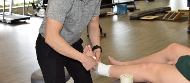 Athletic Taping Guide for Sprained Ankle Recovery in Champaign